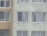 Вид на соседний строещейся дом