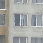 Вид на соседний строещейся дом